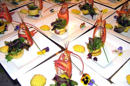 Maine Lobster Salad with Mango, Edible Flowers, Mariquita Ring, Mix Green and Passion Fruit Vinaigrette